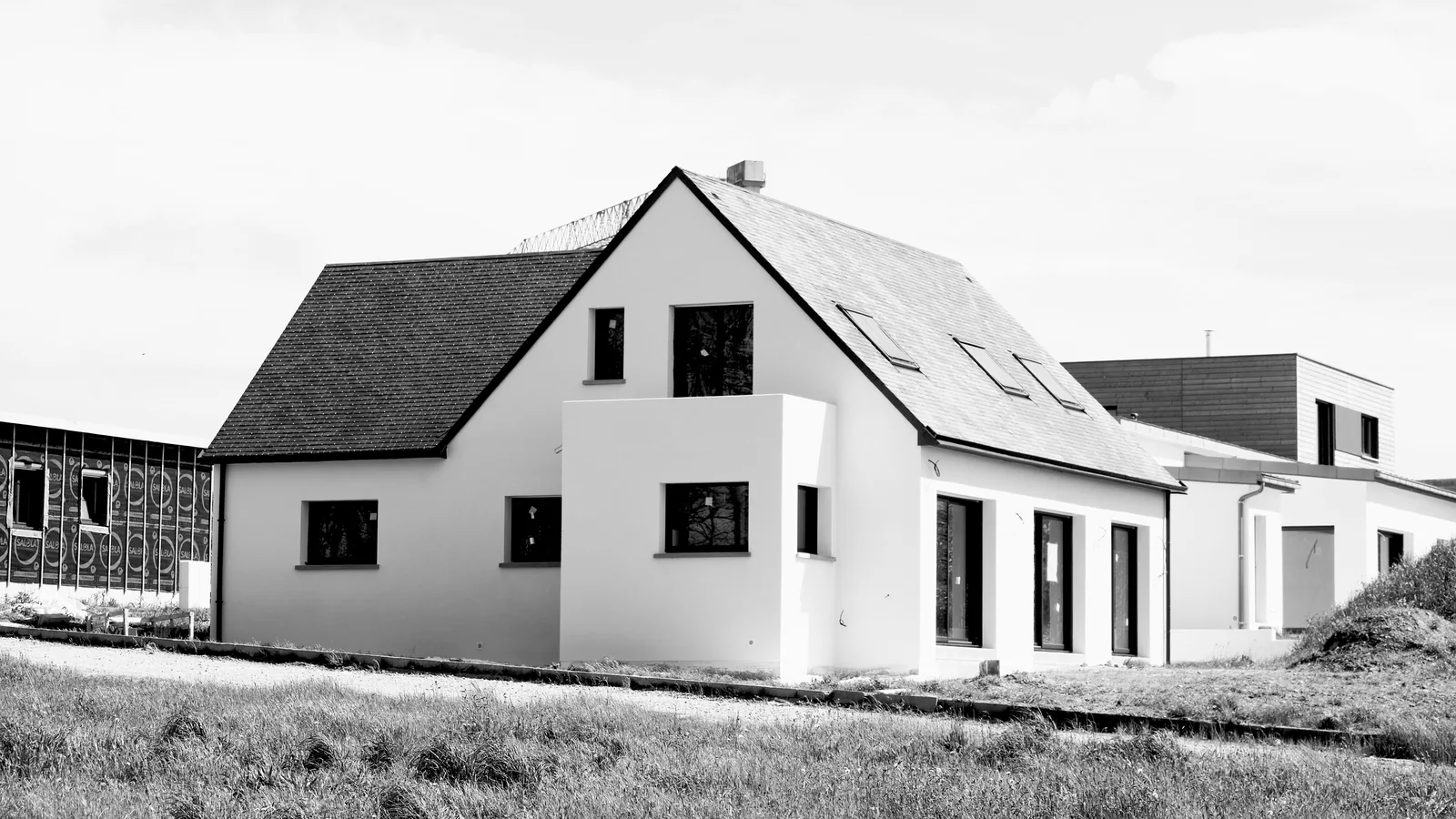 Illustrative stock photo of a single-family residence under construction, not a ClearBuild project